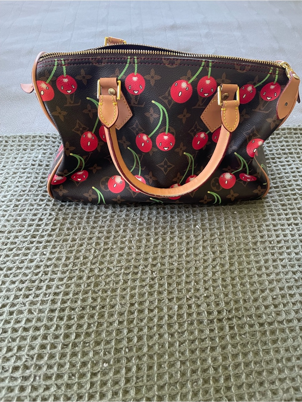 Brown Monogram Cherry Print Satchel with Red Accents.